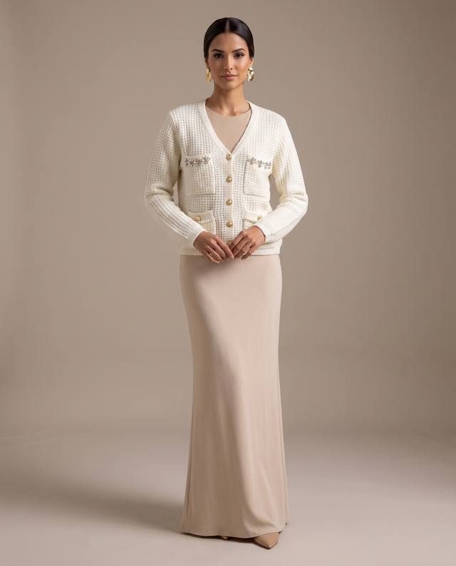 Referente de curaduría — cardigan de lentejuelas